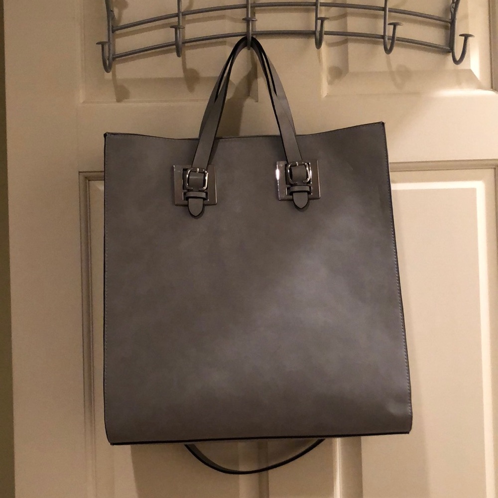 USED ONCE faux leather bag
